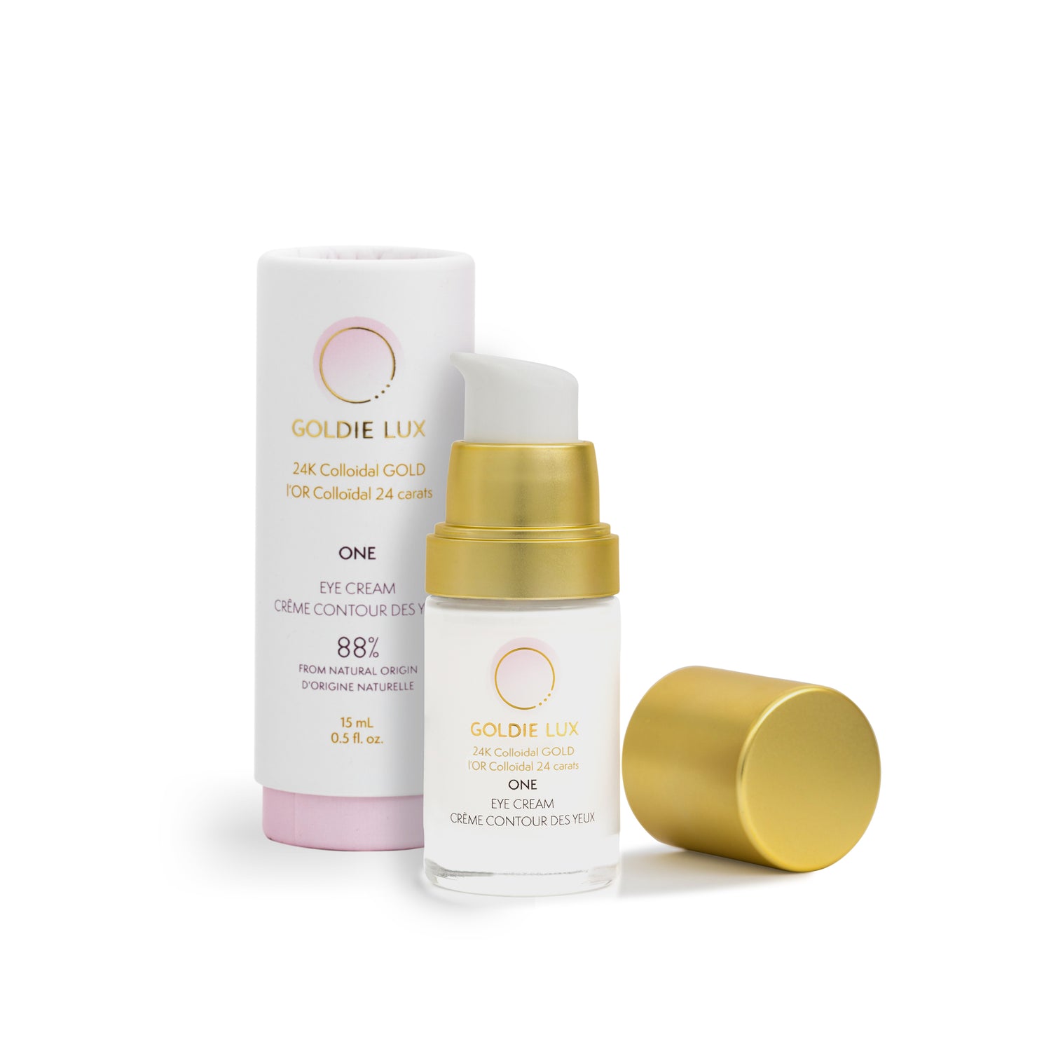 Goldie Lux | 24 Karat Colloidal Gold Eye Cream 15 mL. Cap is removed from glass bottle to show pump, and the outer packaging sits behind the bottle.